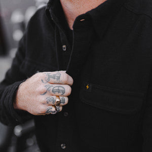 Model wearing Freeway Flannel in black, alternate view