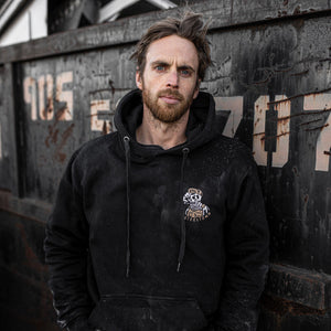 Model wearing Working Class Stiff Hoodie from Steeltown Garage